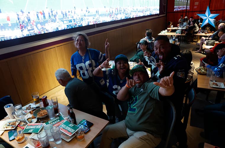 Football fans watch Super Bowl LX at Dave and Buster’s in Honolulu